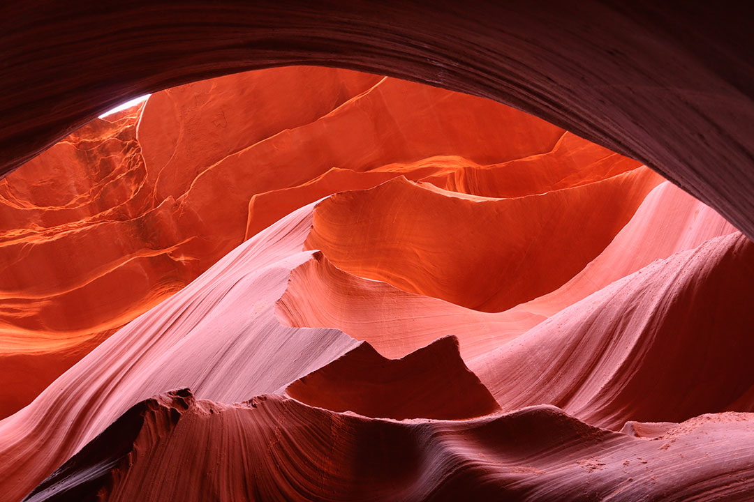 Bright yellow, orange, red and purple colours of Antelope Canyon
