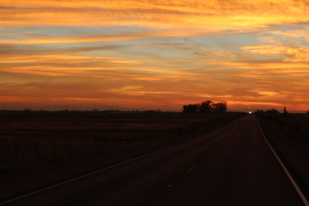 Beautiful orange sunset on the drive home from Yosemite National Park