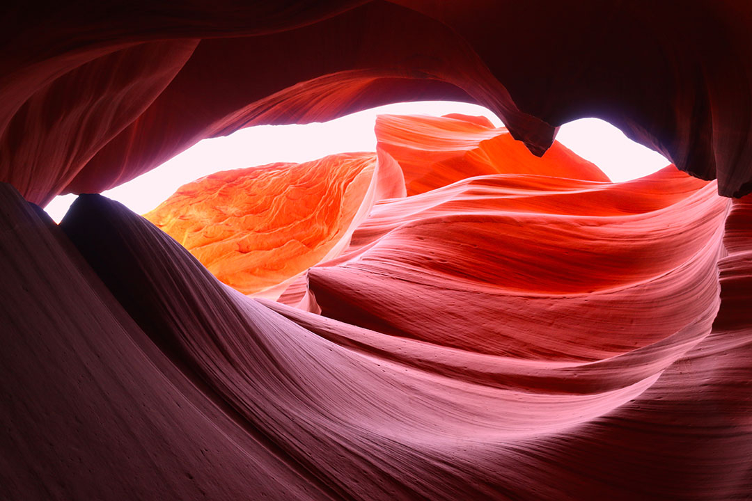 Bright yellow, orange, red and purple colours of Antelope Canyon