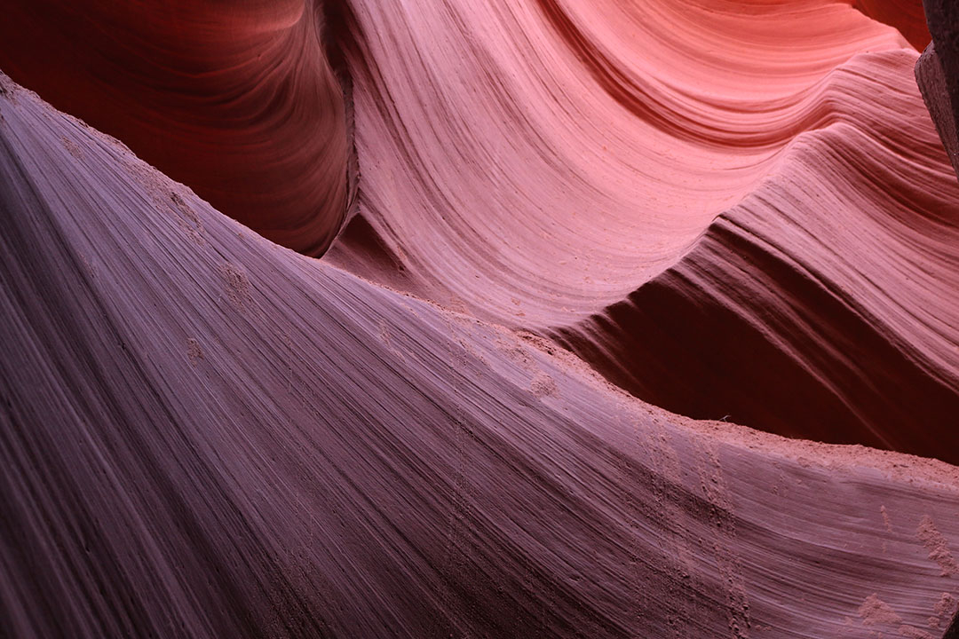 Bright yellow, orange, red and purple colours of Antelope Canyon