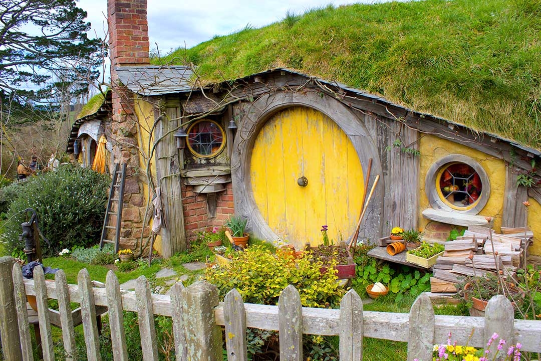 Little yellow hobbit house from Lord of the Rings in Hobbiton, Mata Mata New Zealand North Island