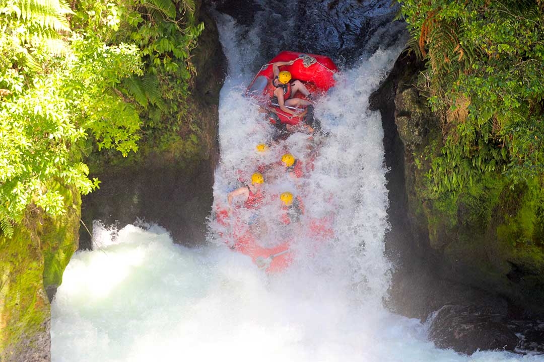 White water rafting mid way down the 7 metre highest commercially rafted waterfall in the world