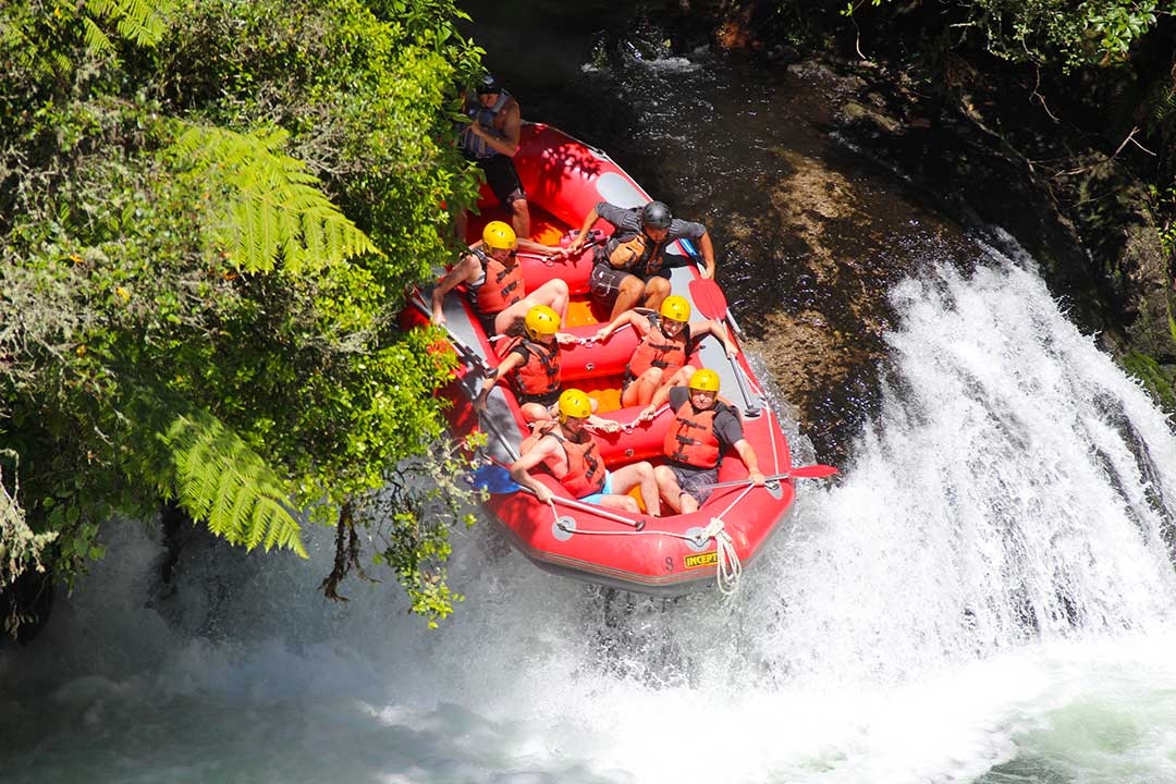 Mum and I with our group of white water rafters about to go over the edge of one of the waterfalls with everyone holding on tight