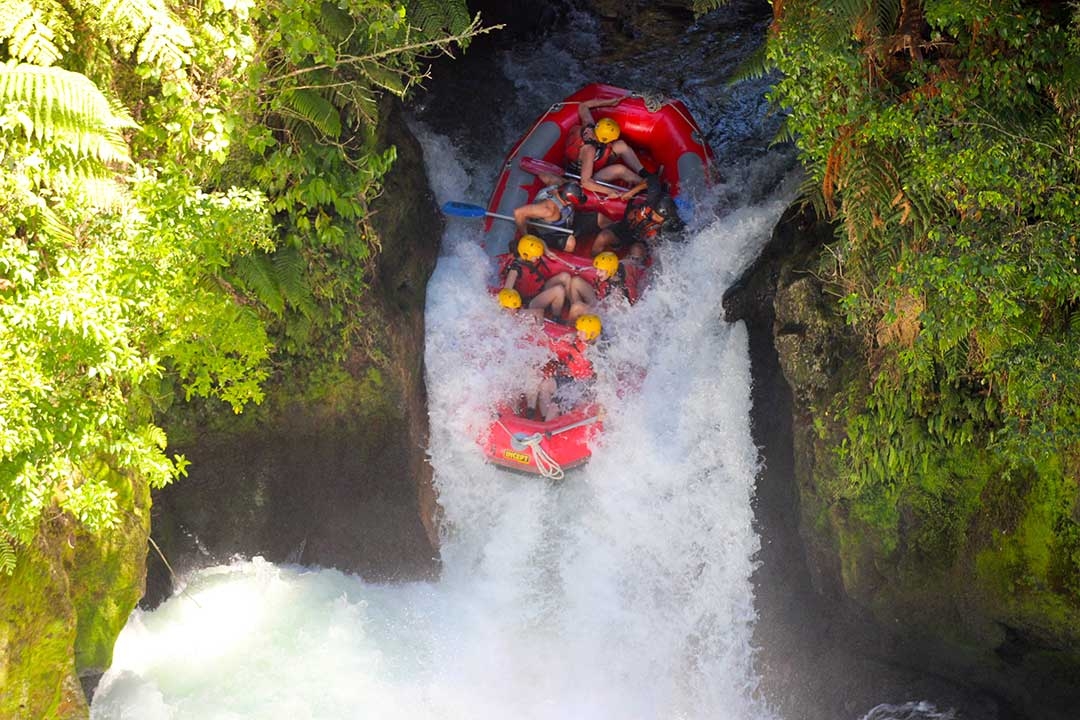 Mum and I with our group of white water rafters about to go over the edge of the highest commercially rafted waterfall in the world at 7 metres with everyone holding on tight