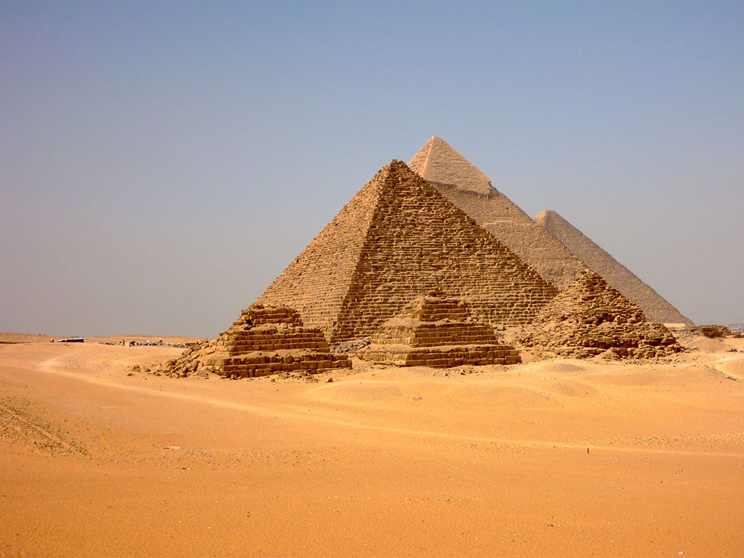 The Grand Pyramids of Giza in Egypt on a dusty hot summer day