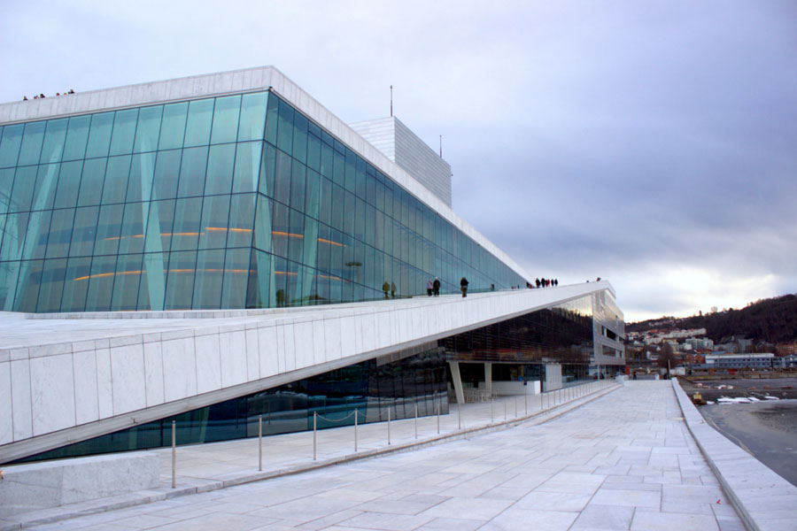 Sharp angles of the ramp leading to the roof of the Oslo Opera House on a cloudy winter day in Norway
