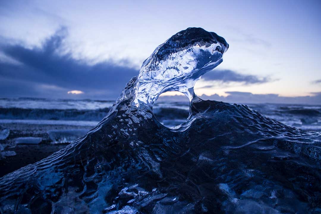 Diamond Beach at Jokulsarlon Glacier Lagoon at sunrise with icebergs on the black sand beach