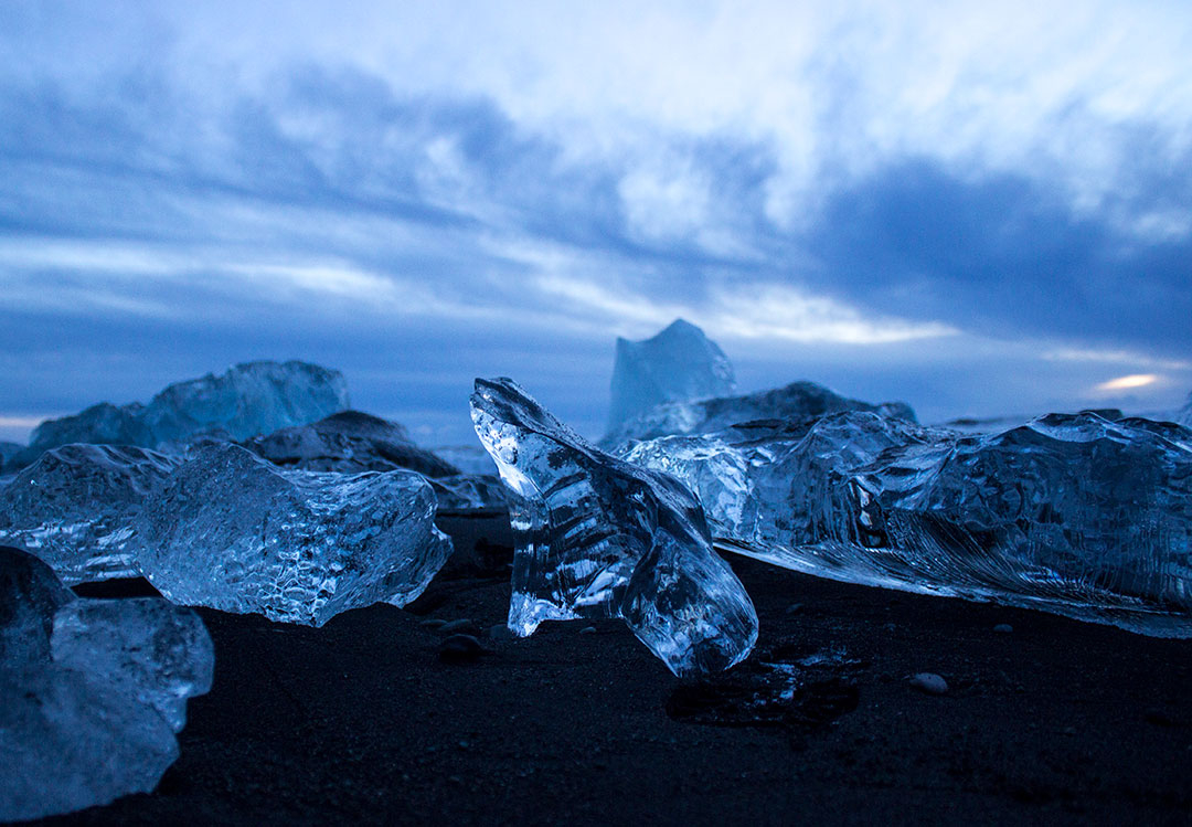 Diamond Beach at Jokulsarlon Glacier Lagoon at sunrise with icebergs on the black sand beach