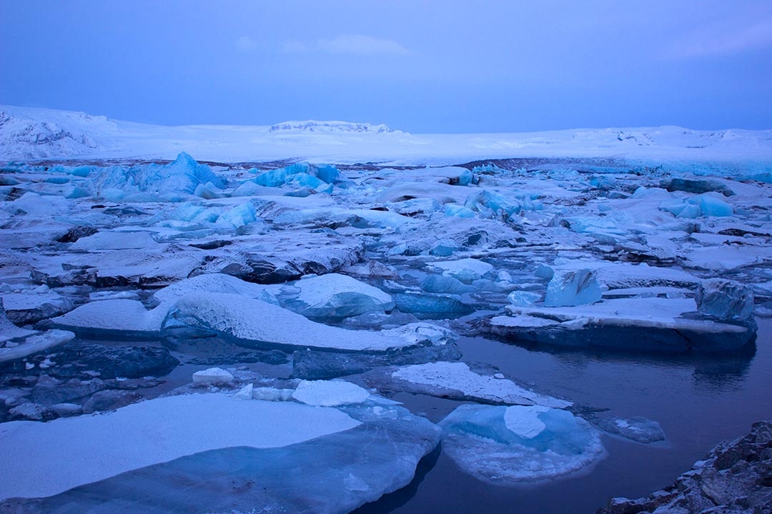 Jokulsarlon Glacier Lagoon at sunrise with blue icebergs